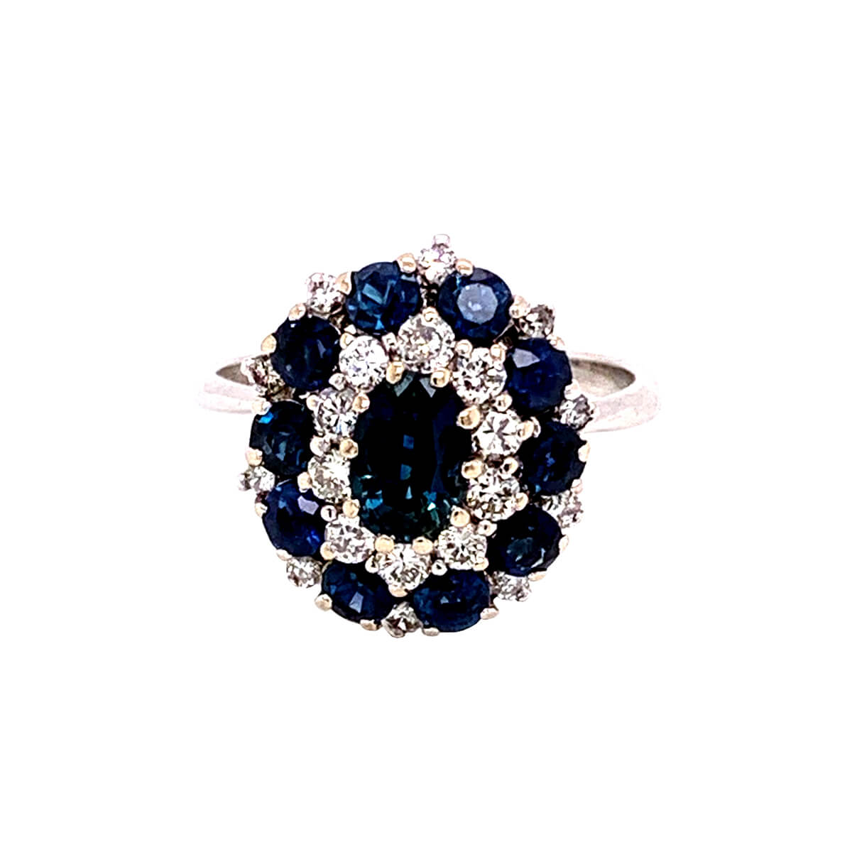 diamond surrounded by sapphires ring